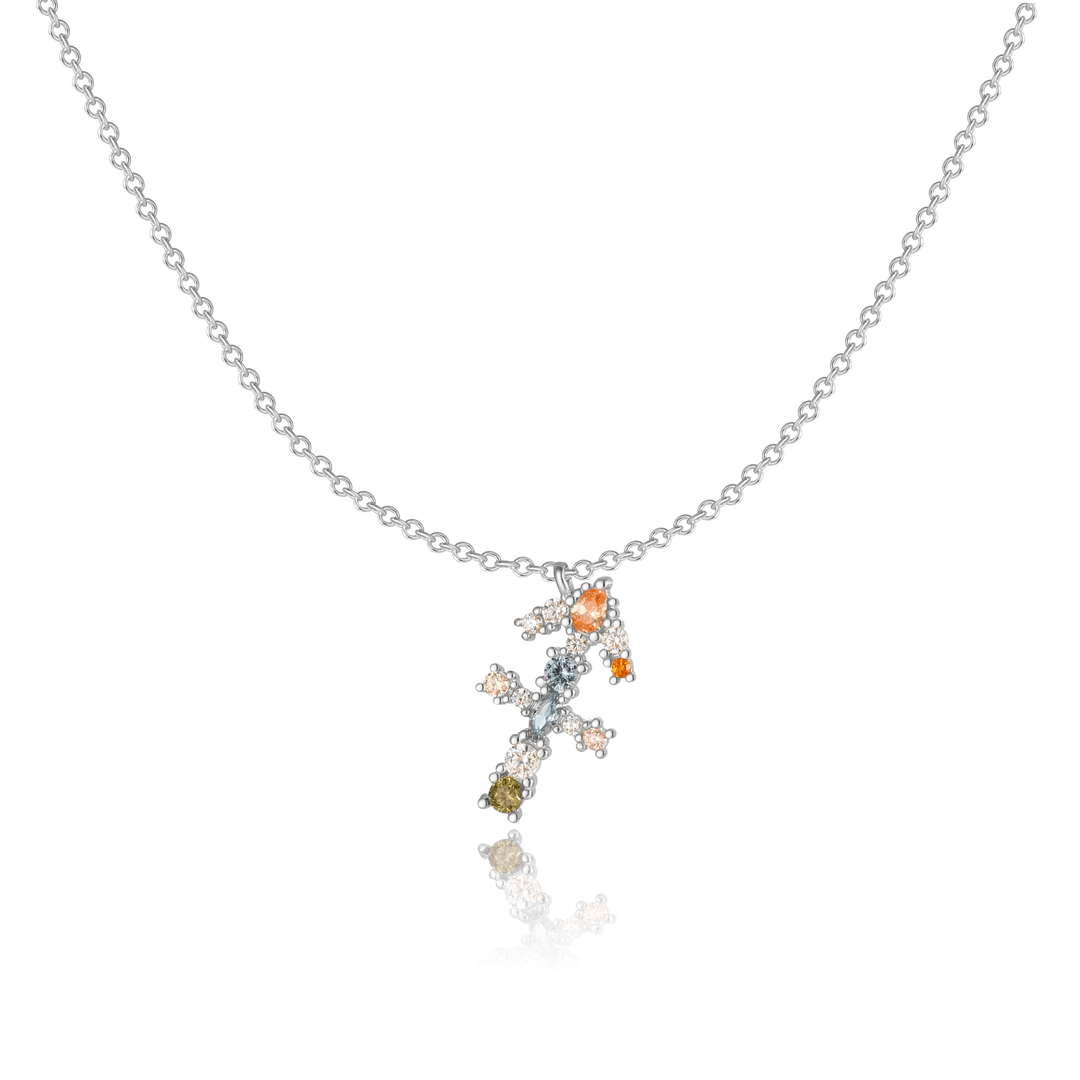 Intricate sterling silver zodiac sign charm detail.