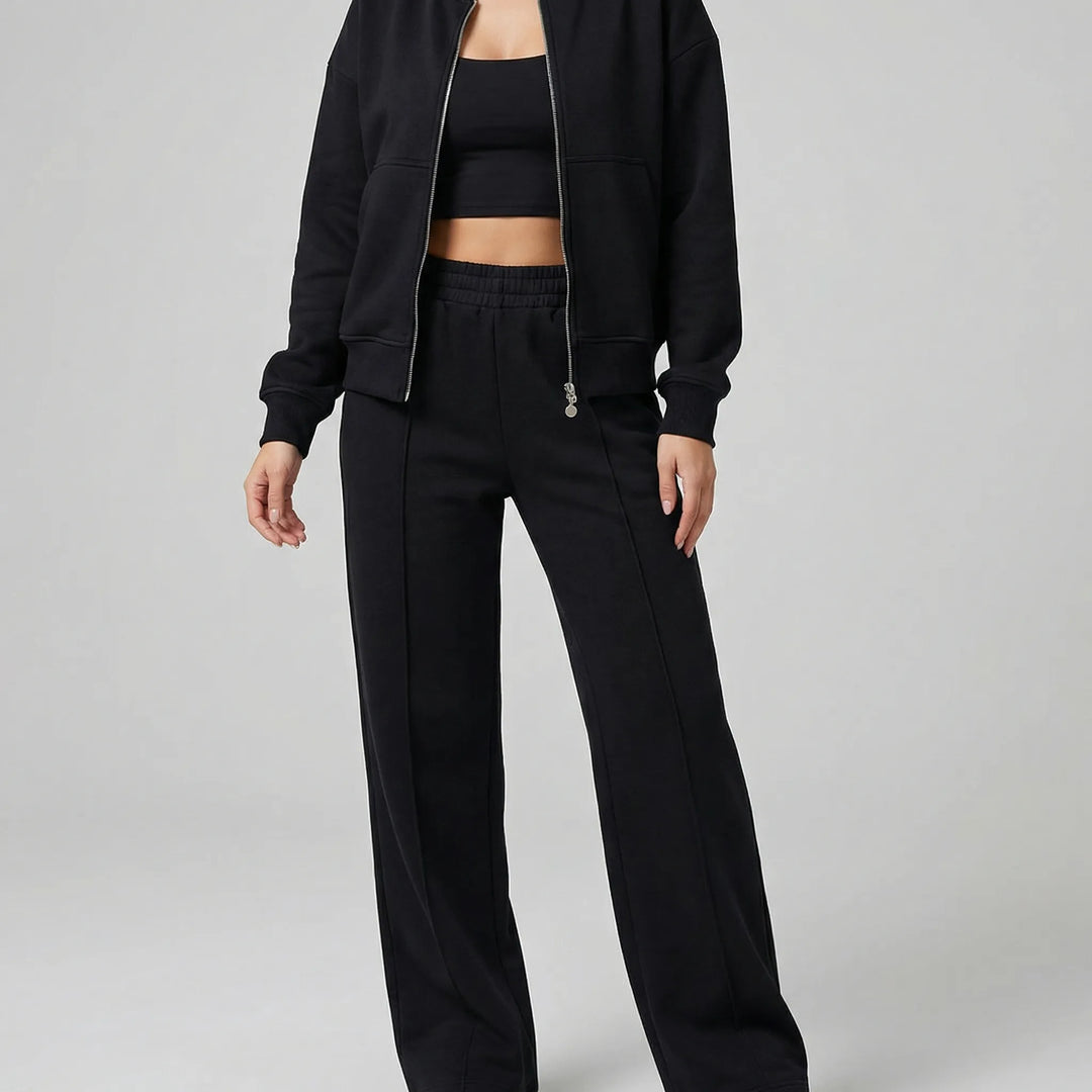 Chic women's coordinated straight leg trousers set with jacket, ideal for workwear or elegant loungewear.