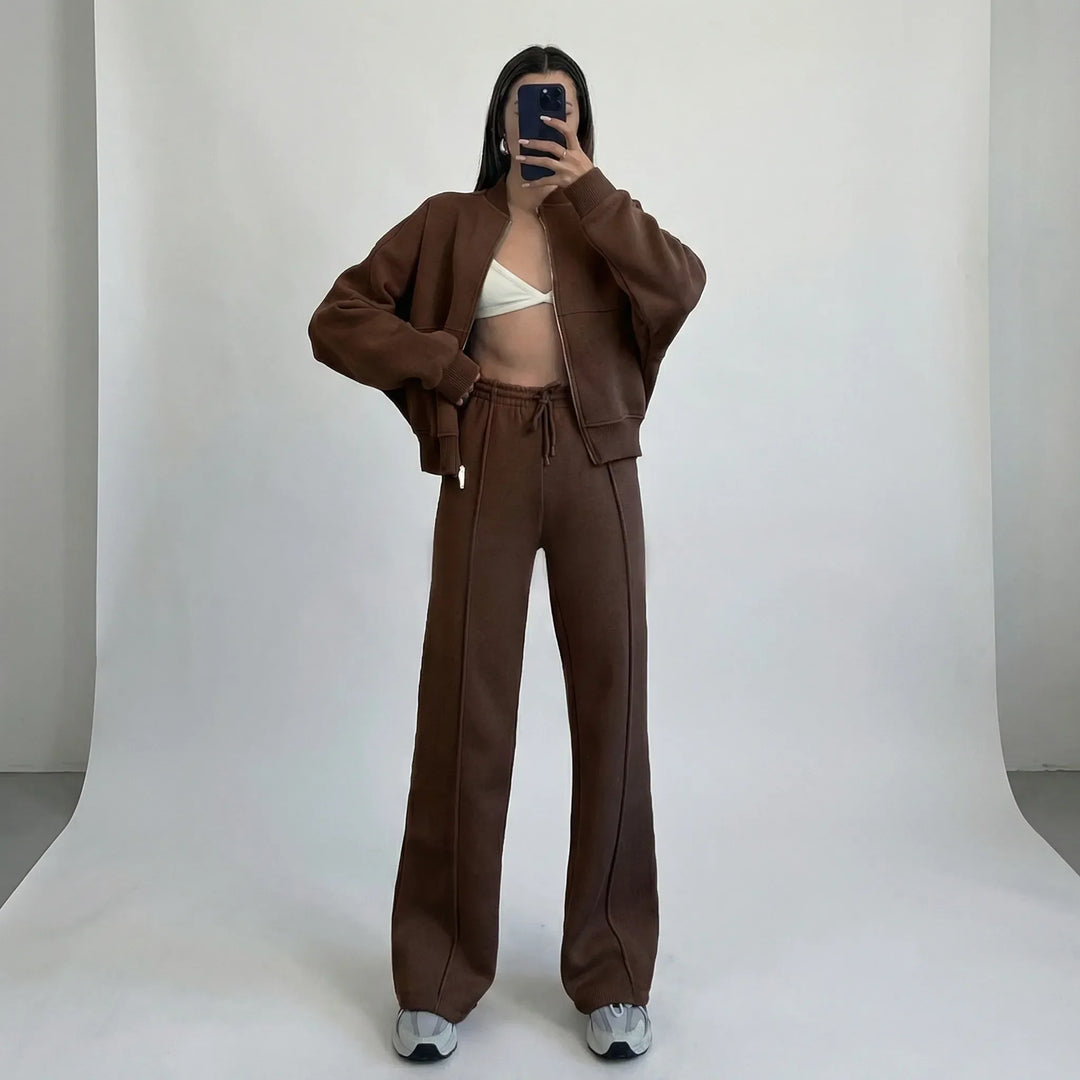 Effortless women's straight leg trousers & jacket set, offering comfort & style for a two-piece casual outfit.
