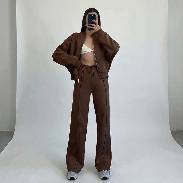 Effortless women's straight leg trousers & jacket set, offering comfort & style for a two-piece casual outfit.