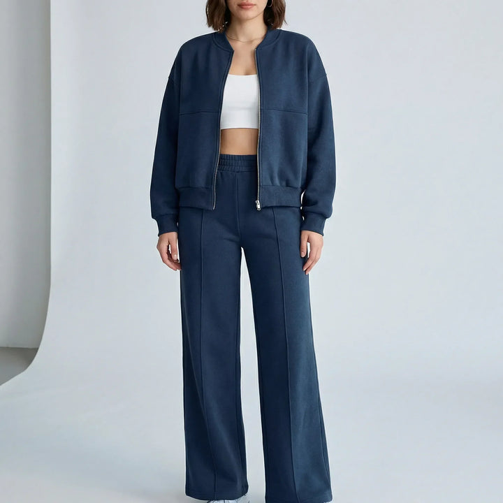 Modern women's regular fit straight leg trousers set with jacket; clean lines for a chic, coordinated look.