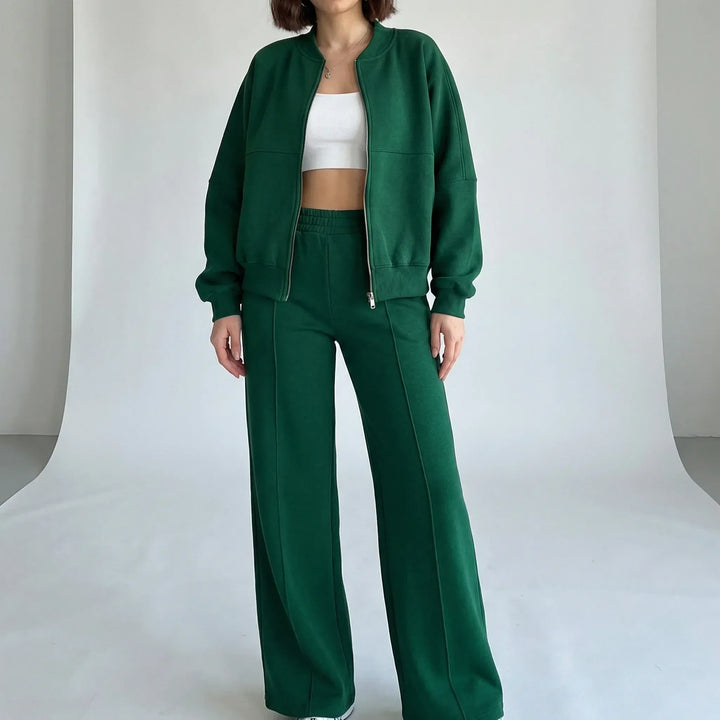 Fashionable women's two-piece straight leg trousers set with jacket; an effortless and stylish ensemble.