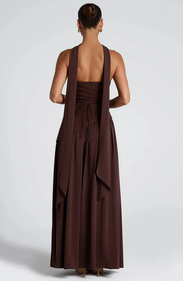 Women's formal strapless maxi dress, elegant and flowy with an asymmetric cut.