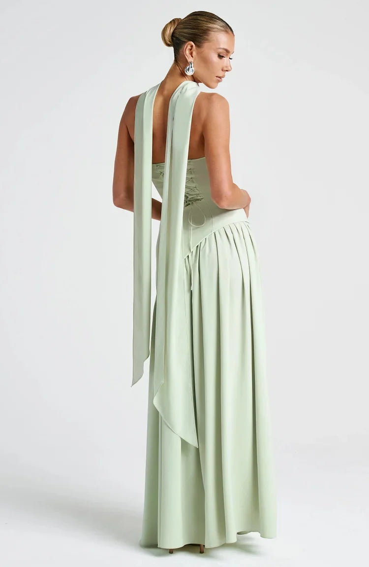 Party-ready women's asymmetric strapless maxi dress, sophisticated.