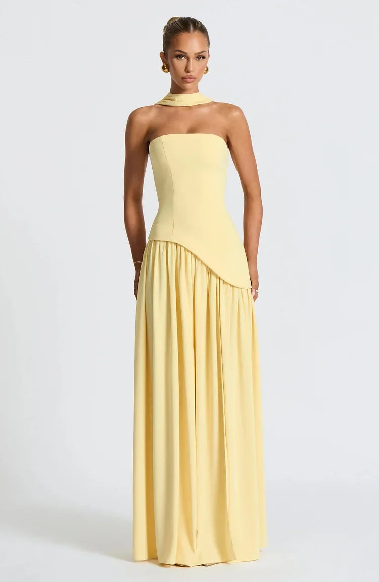 Asymmetric strapless maxi dress for women, elegant, formal, and flowy.