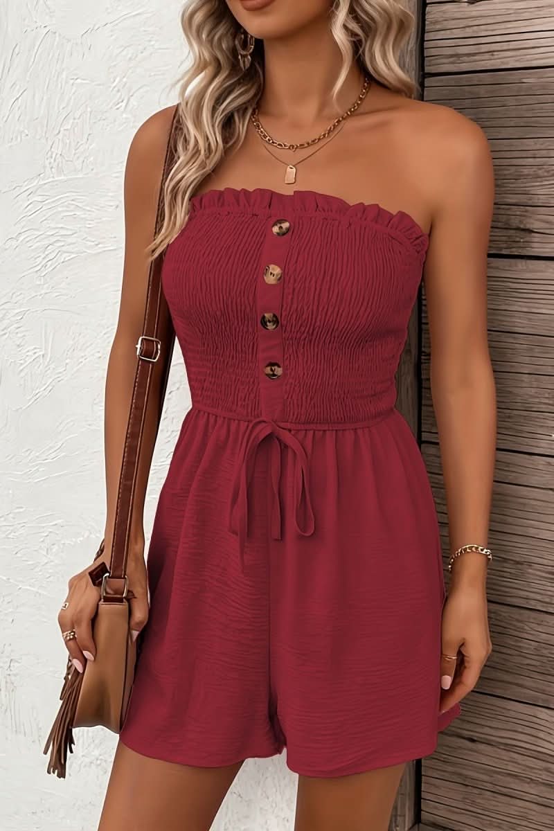 Chic strapless button front summer romper for women. Ideal for vacation, beach days, or casual outings.