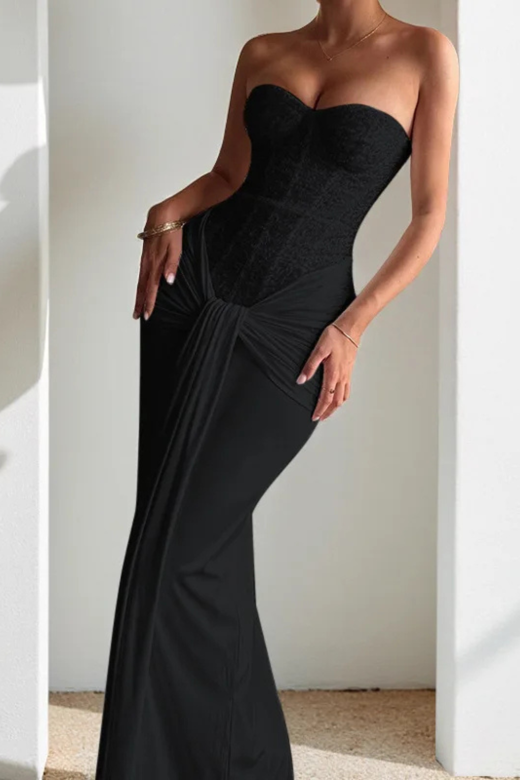 Slim-fit strapless mermaid maxi dress with corset bodice, perfect for evening wear.