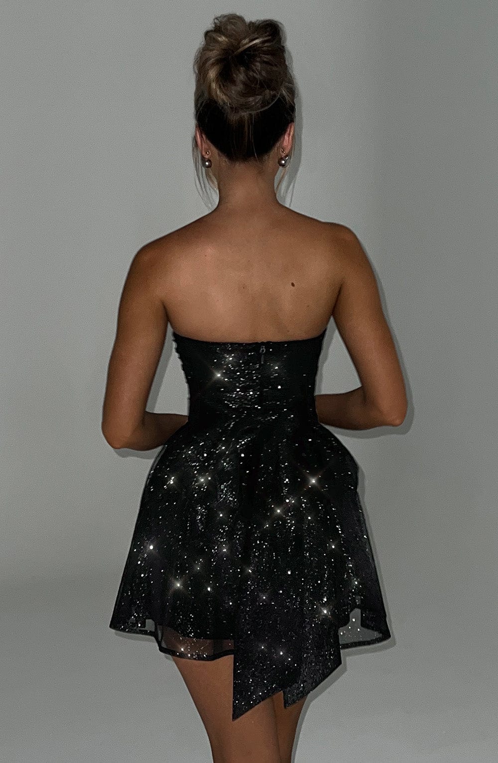 Elegant women's strapless skater dress with glitter, ideal for homecoming & formal events.