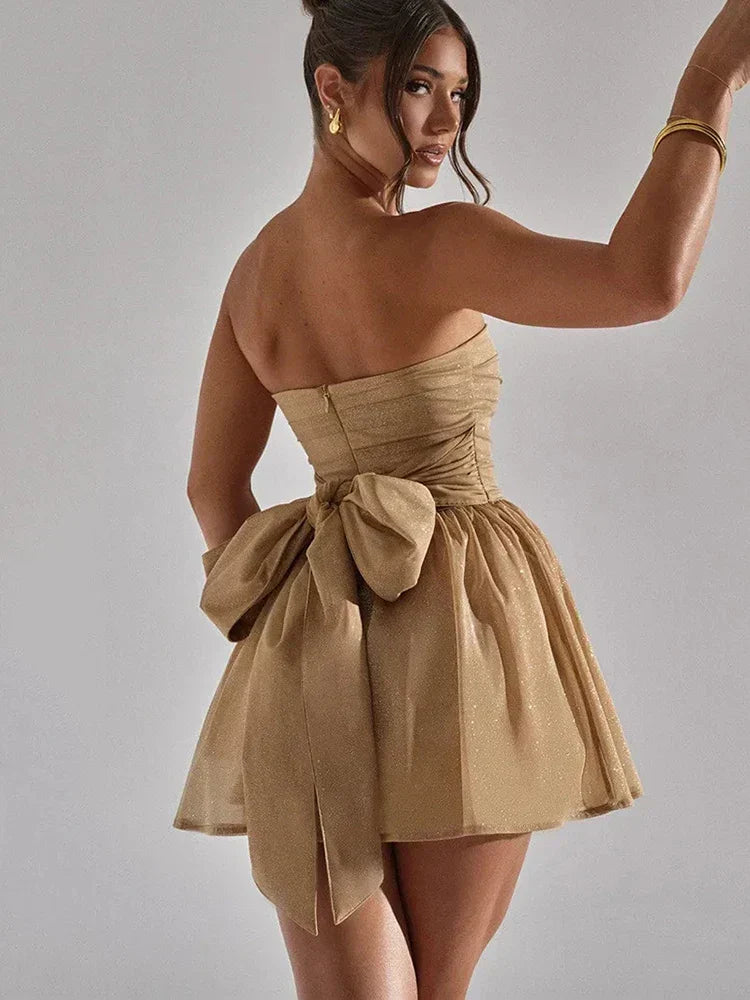 Dazzling strapless mini skater dress for women, featuring a sparkly design, ideal for homecoming dance.