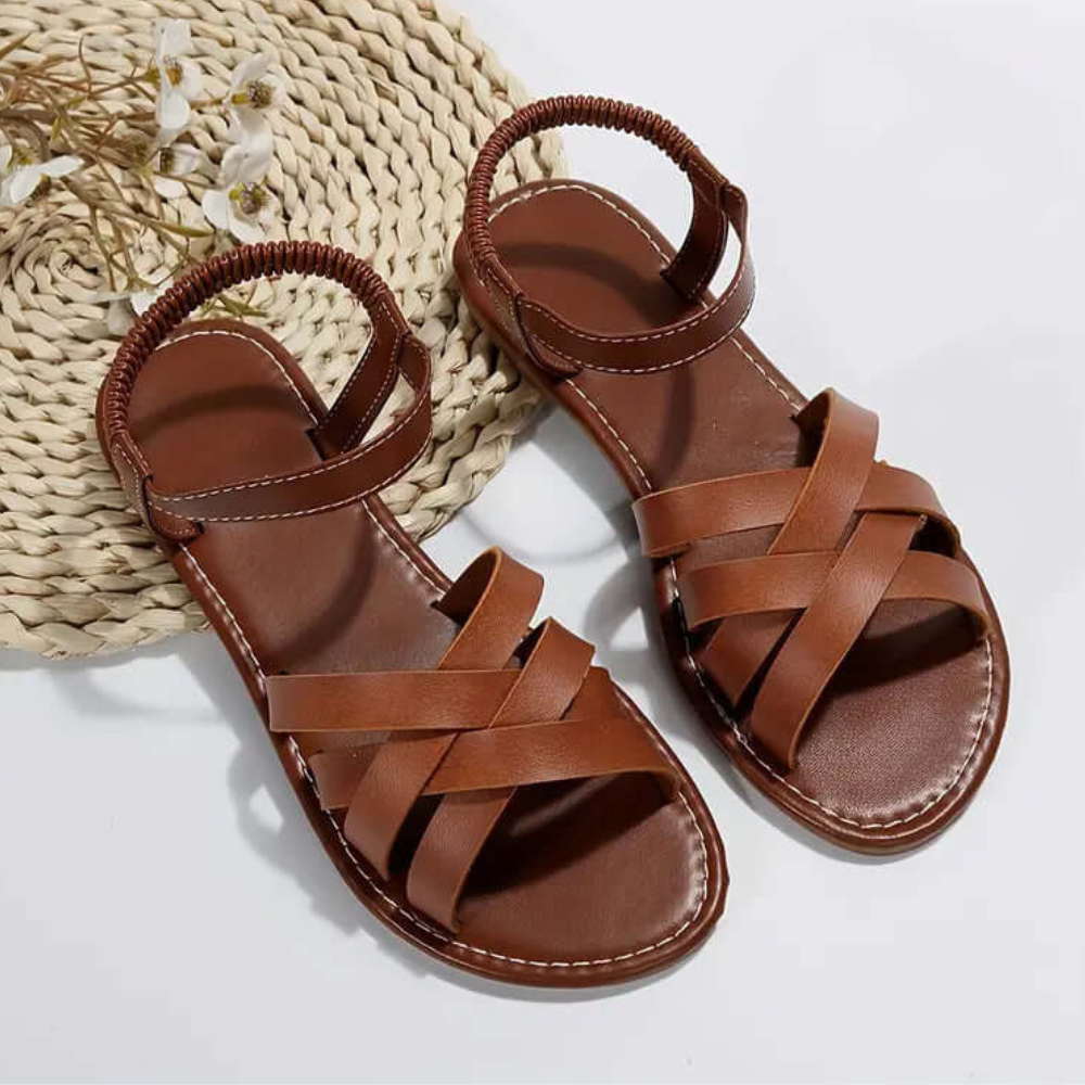 Strappy open-toe flat sandals for women, offering ultimate comfort and casual style.
