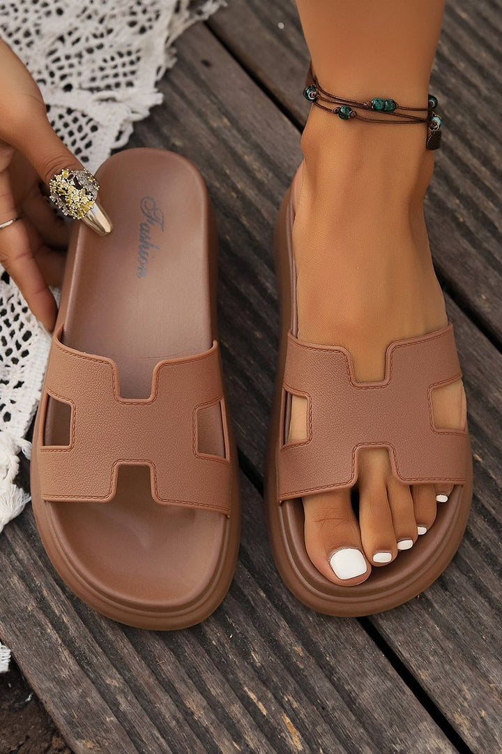 Casual women's slip-on sandals, strappy summer footwear for comfort.