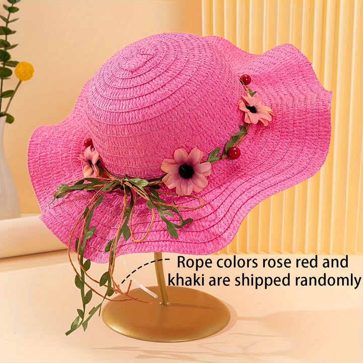 Hand-crafted women's straw hat for summer, featuring delicate floral and fruit embellishments.