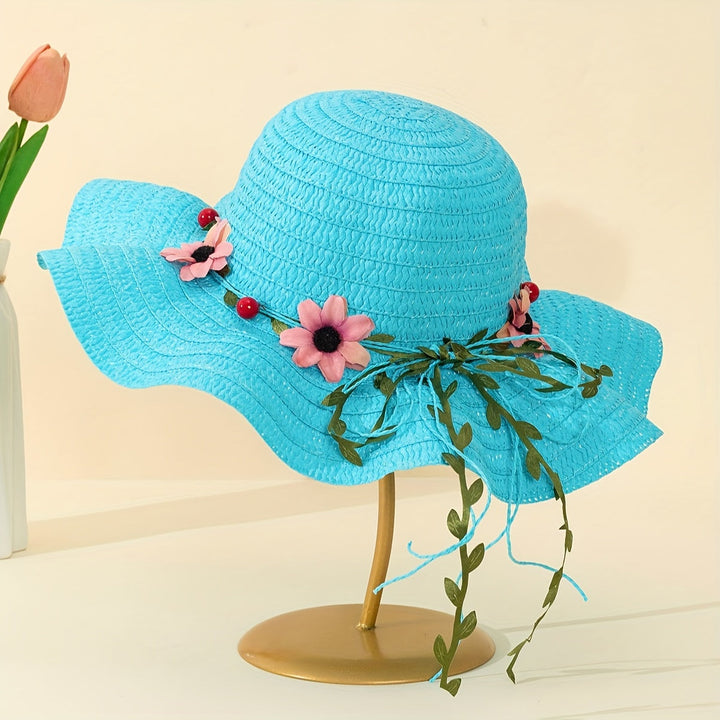 Women's summer straw hat offers stylish sun protection, adorned with vibrant floral & fruit details.