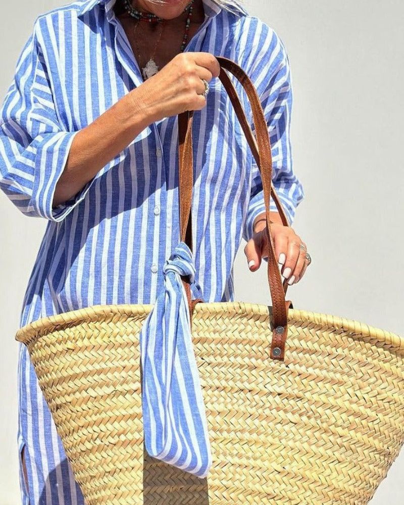 Spring/Summer striped button-down shirt dress for women, a versatile midi style with convenient pockets.