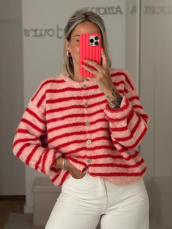 Comfortable women's striped cardigan with button-front. Stylish relaxed-fit long-sleeve, ideal for casual wear.