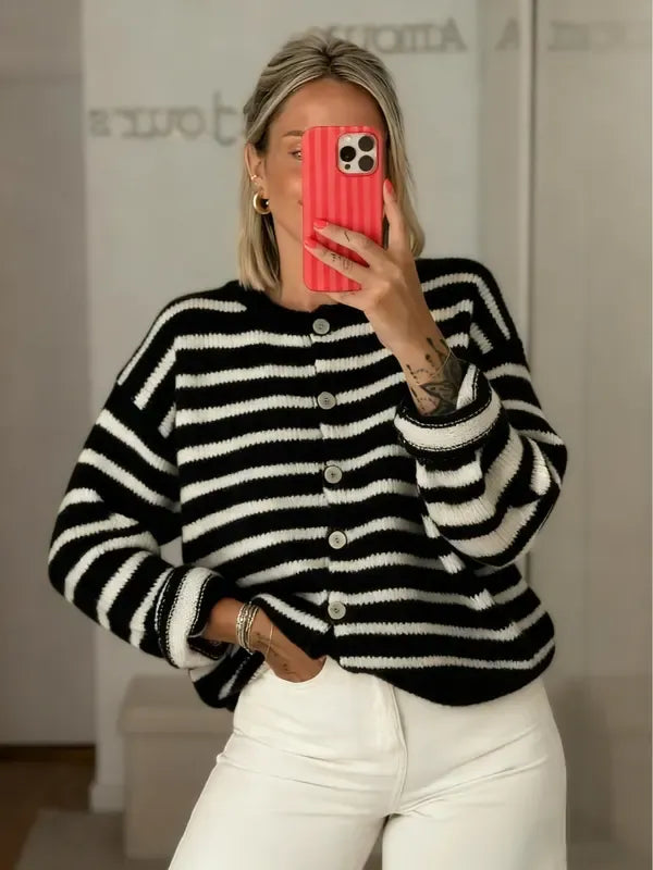 Relaxed-fit women's striped cardigan with a classic button-front. Long-sleeve V-neck for comfortable, casual style.