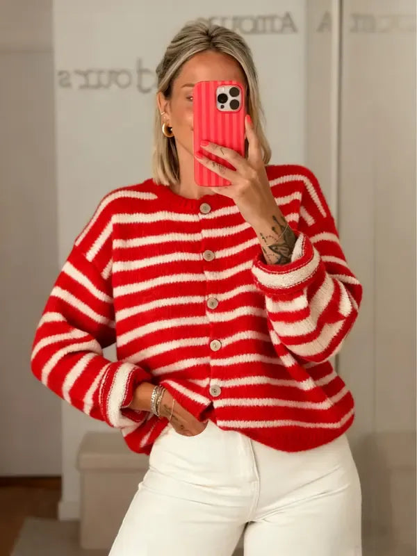 Stylish women's long-sleeve striped cardigan. Button-front closure offers versatile, comfortable casual layering.