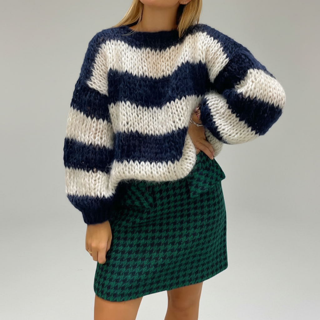 Hannah striped knit sweater for women, featuring a loose fit and chunky knit for ultimate coziness.