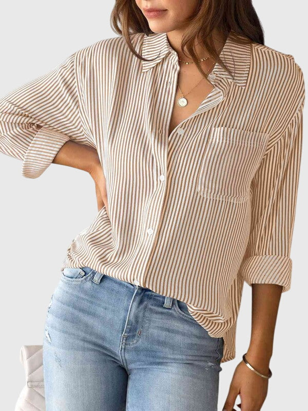 Chic striped long sleeve collared shirt for women, a smart button-down for workwear fashion.