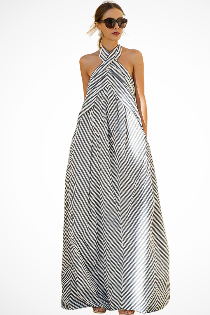 Striped A-line maxi dress with a halter neck. Women's flowing summer sundress for casual events.