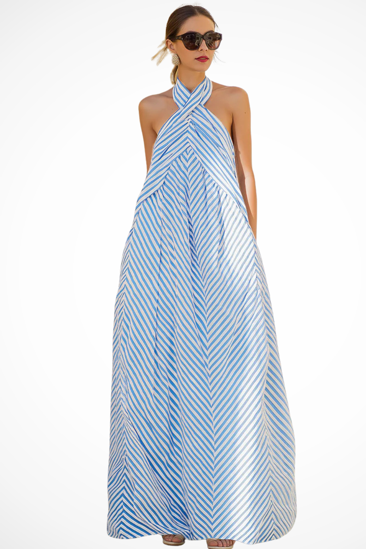 Flowing women's striped halter neck maxi dress. Relaxed fit sundress, perfect for summer comfort and style.