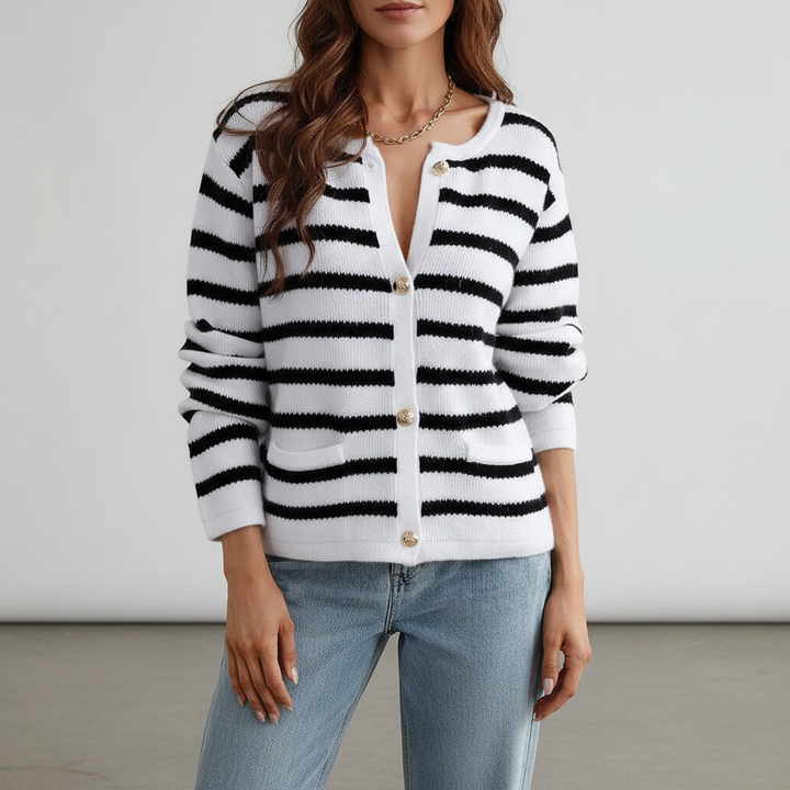 Warm winter sweater: women's striped cardigan, knit, with sophisticated gold buttons.