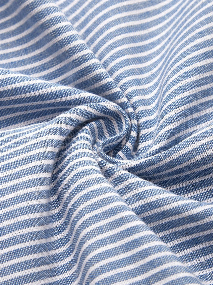 Chic women's striped midi dress with elegant button detail. Comfortable and versatile for casual or daily summer wear.