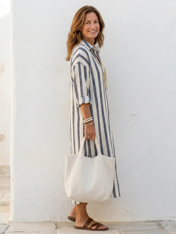 Relaxed fit women's striped midi shirt dress with long sleeves & button-front closure, perfect for spring fashion.