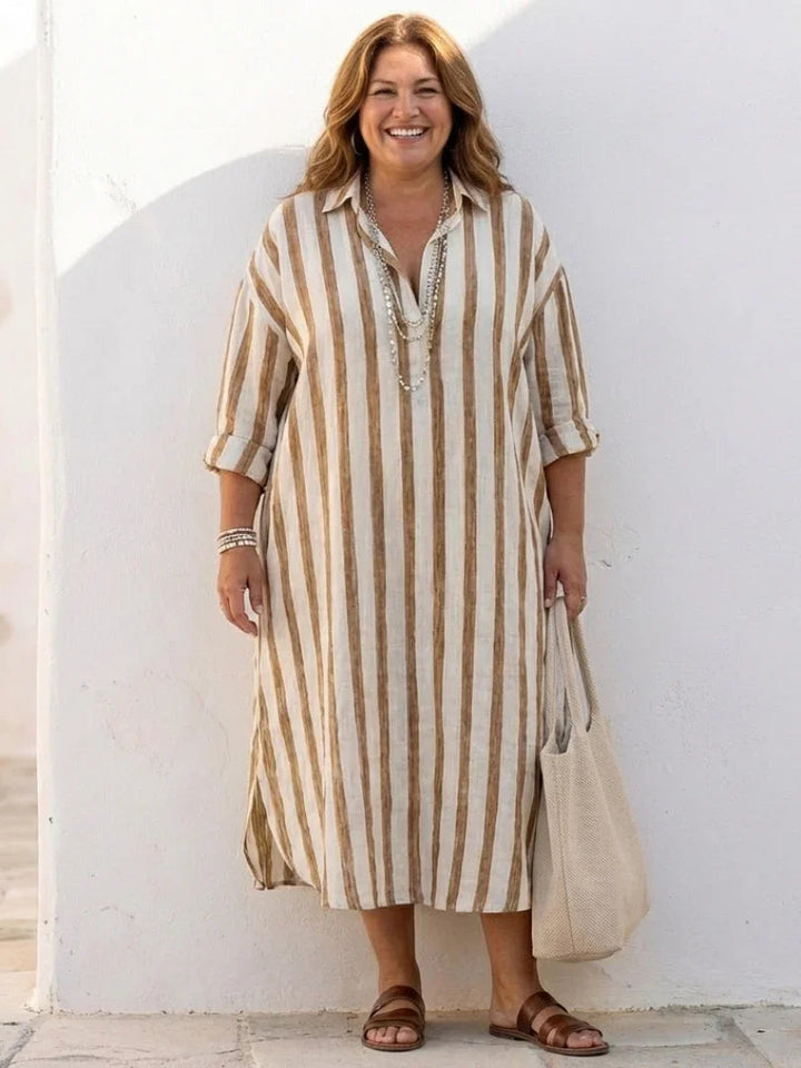 Women's striped midi shirt dress with long sleeves, offering a comfortable relaxed fit & chic everyday style.