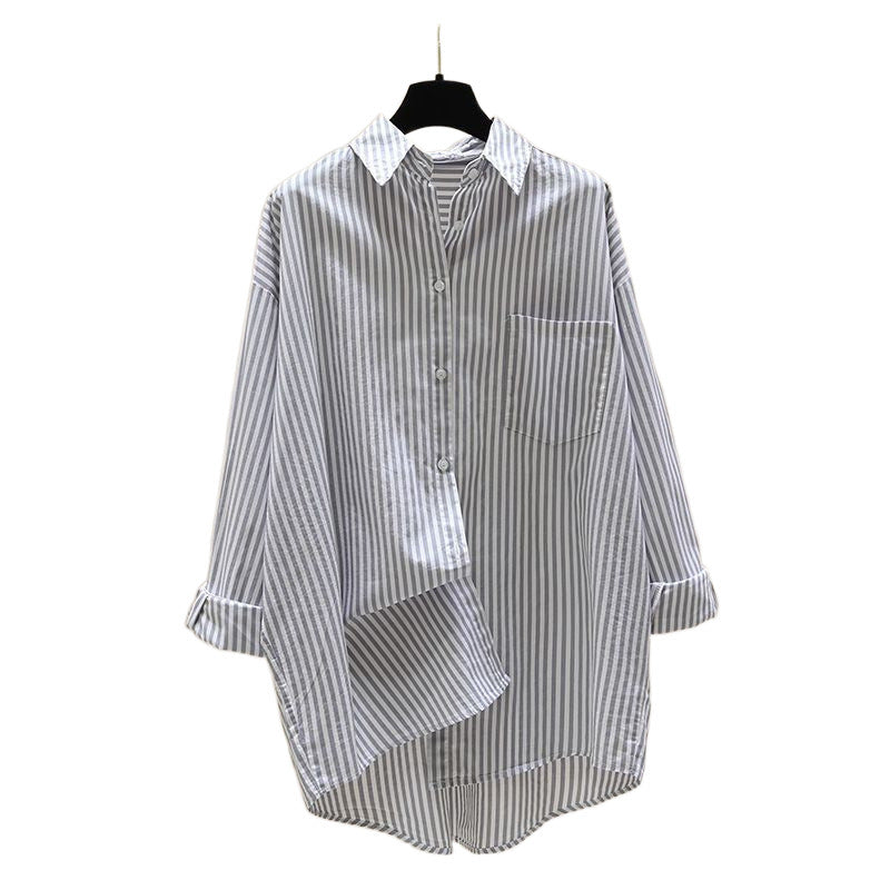 Chic women's striped oversized button-down shirt with a single chest pocket.