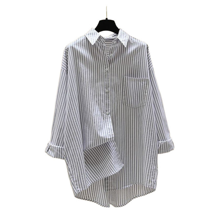 Chic women's striped oversized button-down shirt with a single chest pocket.
