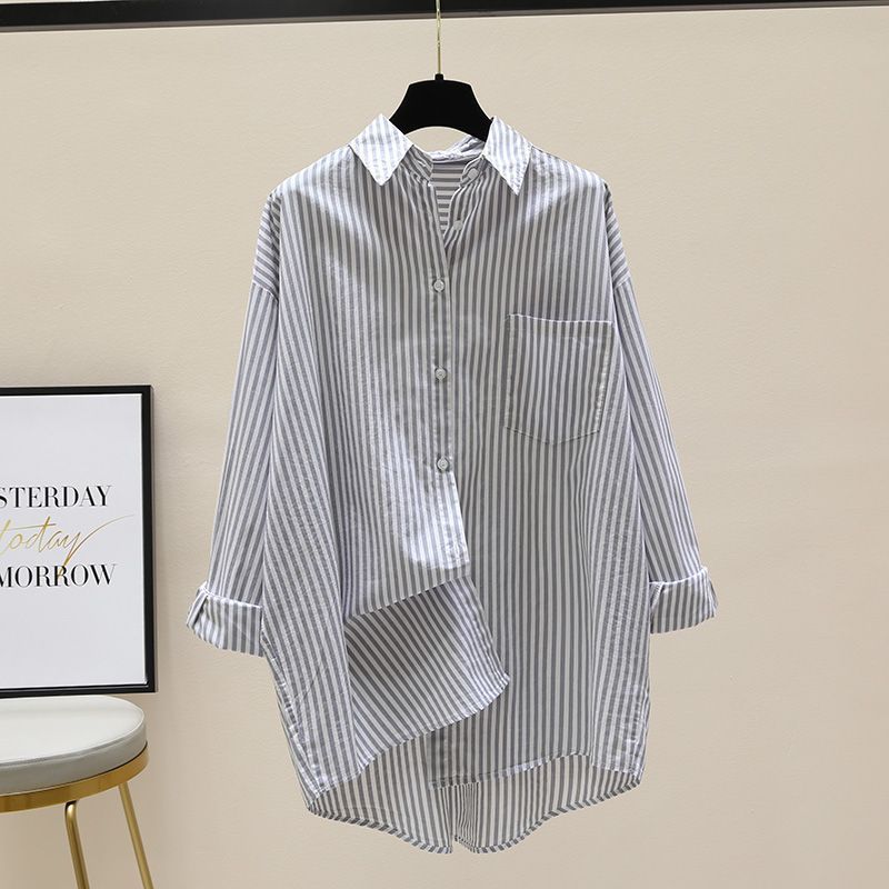 Women's striped oversized button-down shirt, a comfy longline top for daily wear.