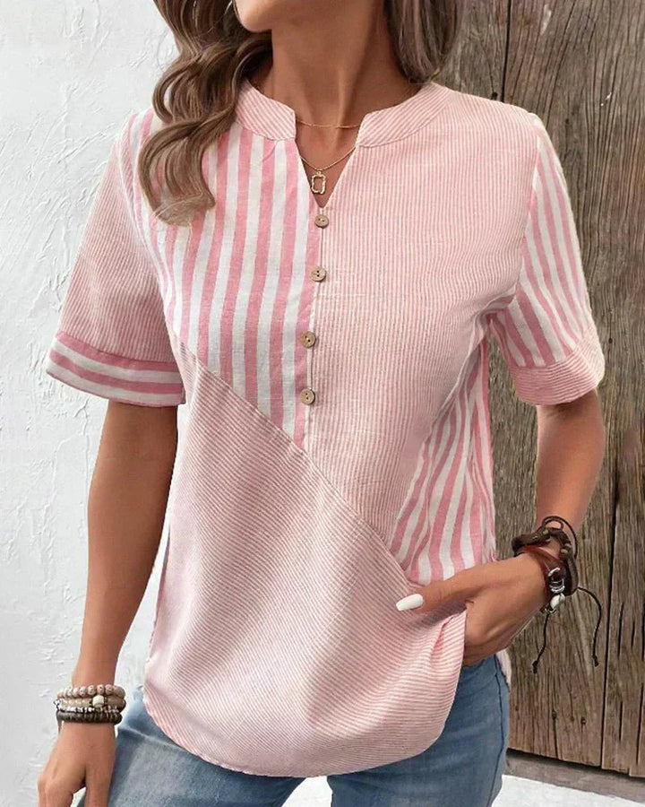 Women's striped short sleeve blouse, a versatile top for casual wear or office chic.