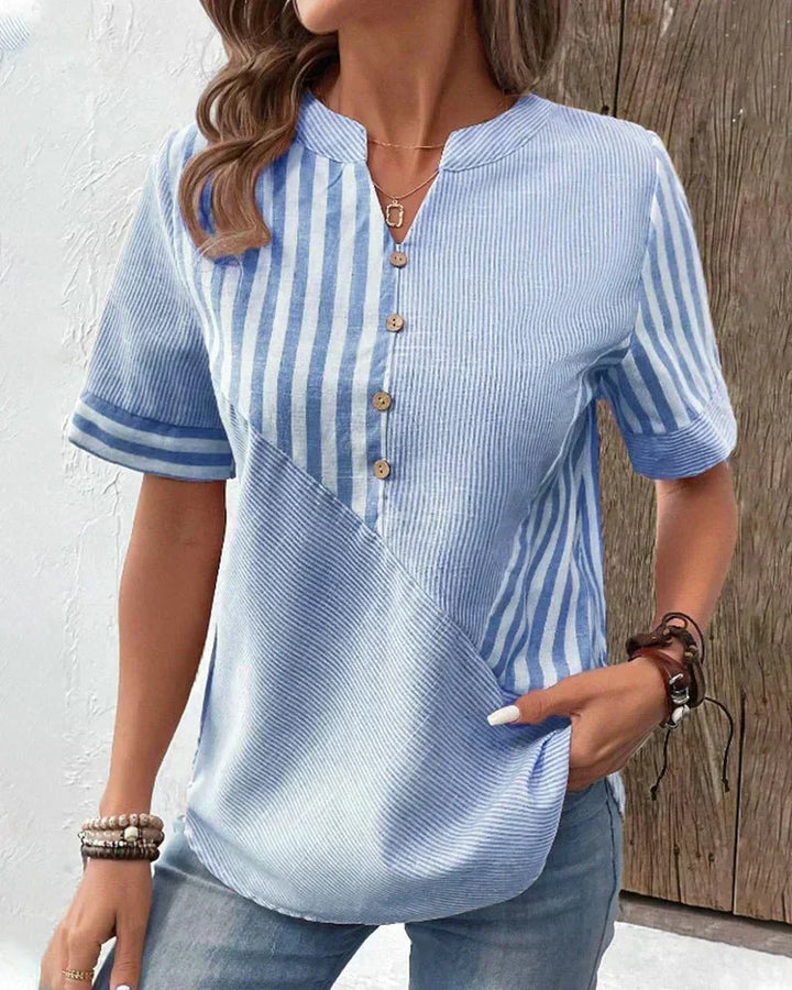 Elegant women's striped short sleeve blouse, ideal for office chic or daily wear.