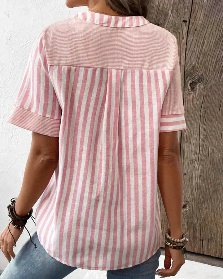 Versatile women's striped short sleeve blouse, suitable for casual outings or professional settings.