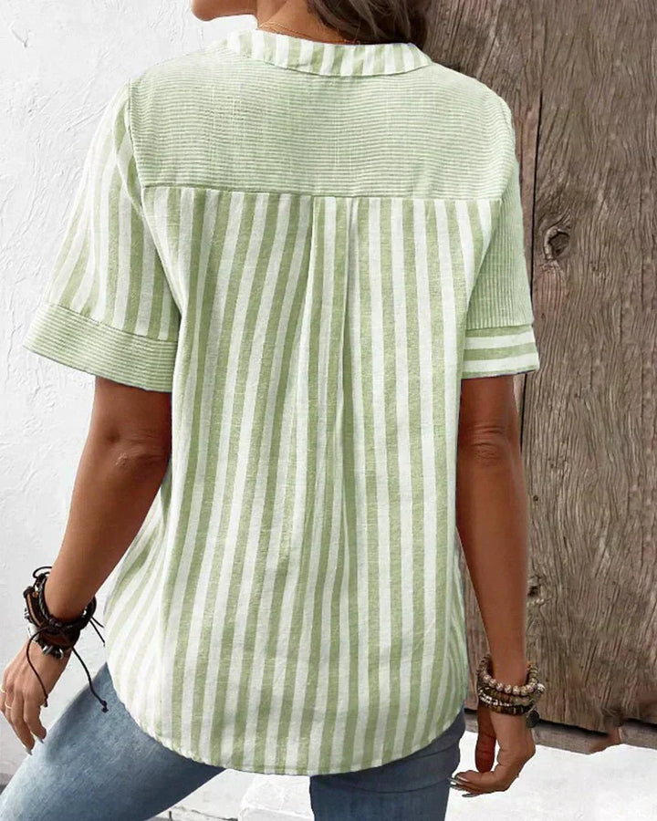 Short sleeve striped blouse for women, a comfortable & stylish choice for warm weather fashion.