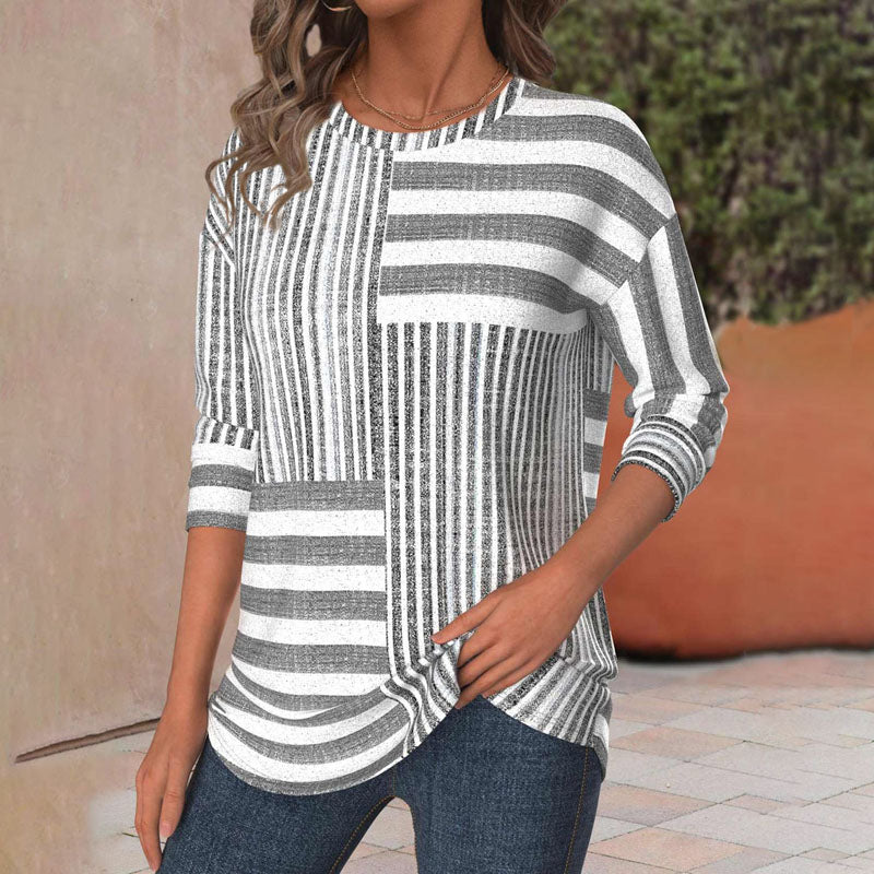 Versatile striped short sleeve top for women. A relaxed fit blouse, great for workwear or casual everyday style.