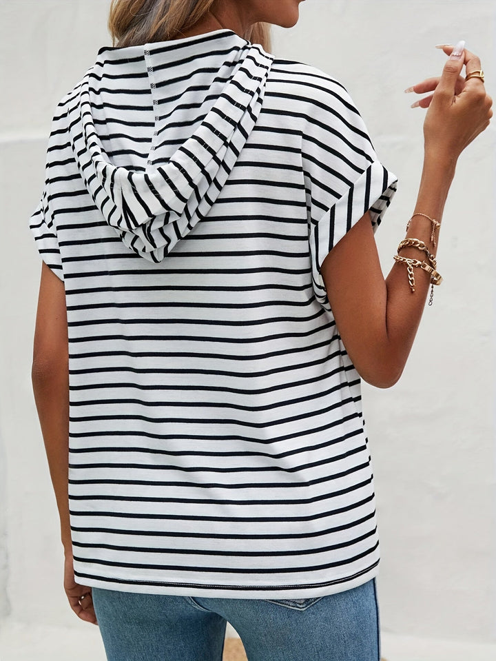 Close-up of women's short-sleeve striped hoodie showing button closure and fabric texture