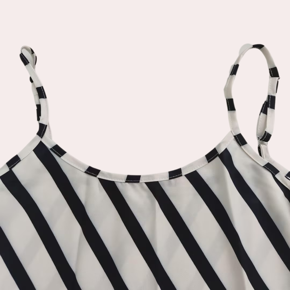 Beach-ready sleeveless striped midi dress for women, a stylish and lightweight summer essential