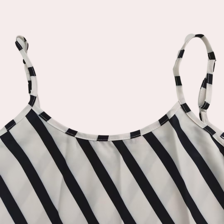 Beach-ready sleeveless striped midi dress for women, a stylish and lightweight summer essential