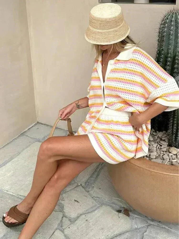 Chic women's striped short outfit, a trendy two-piece clothing set for warm weather fashion.