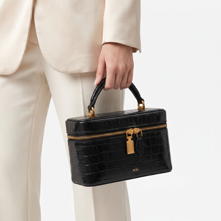 Versatile women's embossed box bag, convertible as a crossbody, shoulder bag, or chic handbag.