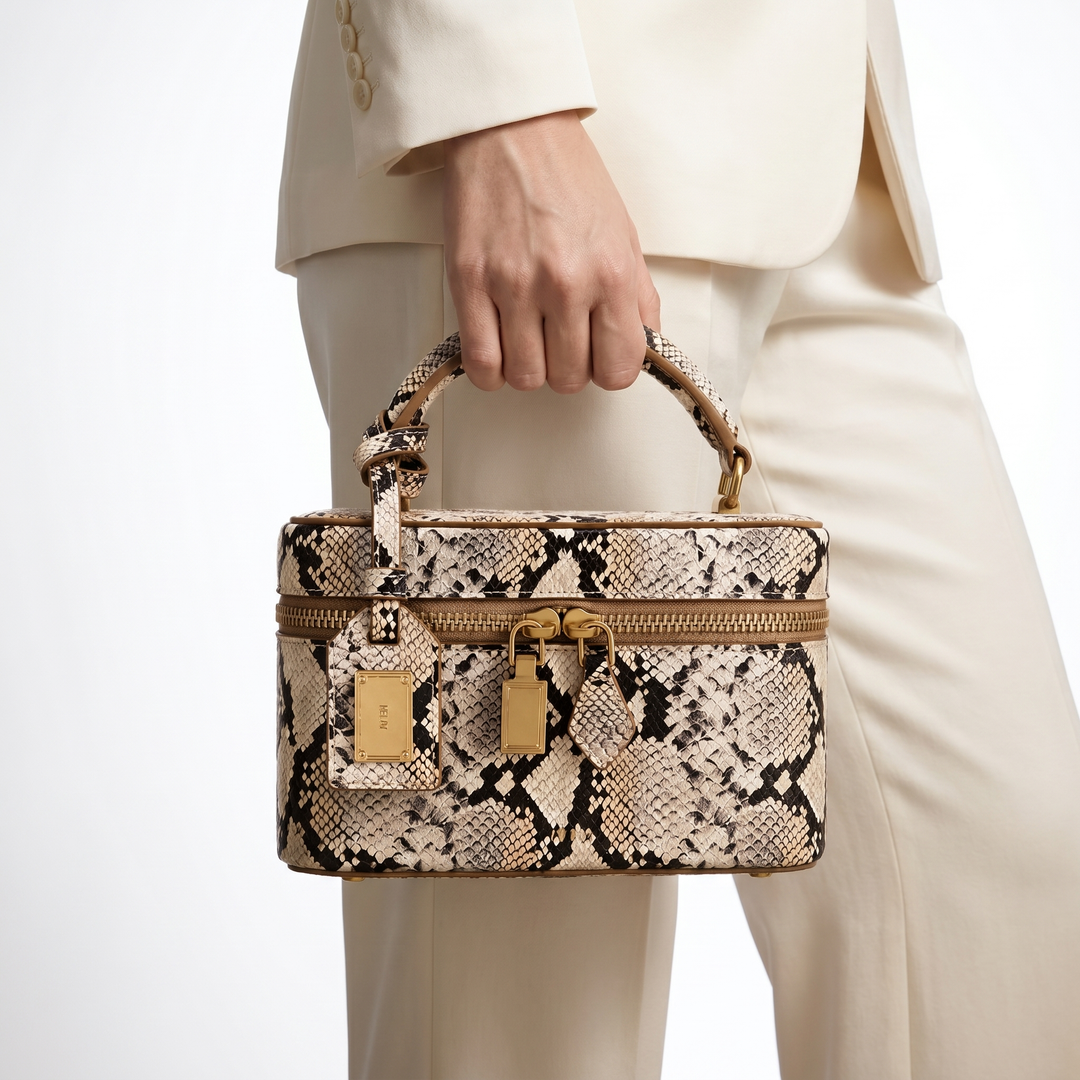 Stylish women's structured handbag featuring unique crocodile-embossed detailing for evening or day.