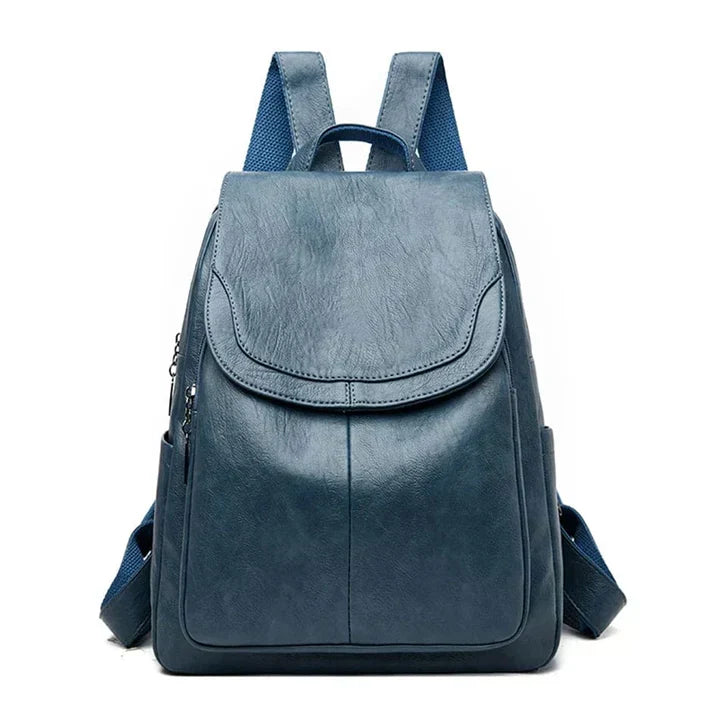 Durable women's daily backpack, a structured flap design perfect for carrying essentials with style.