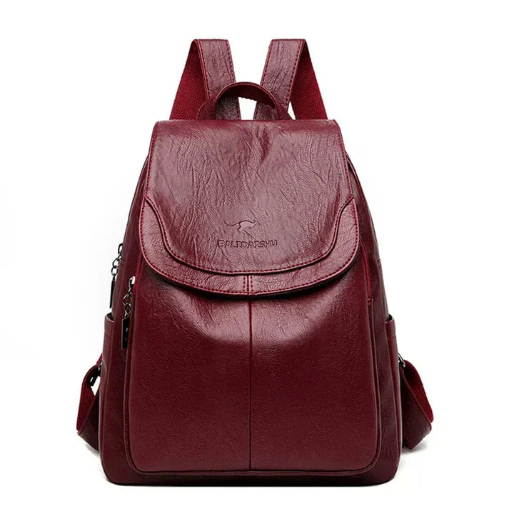 Everyday carry flap backpack for women; a versatile structured bag designed for comfort & style.