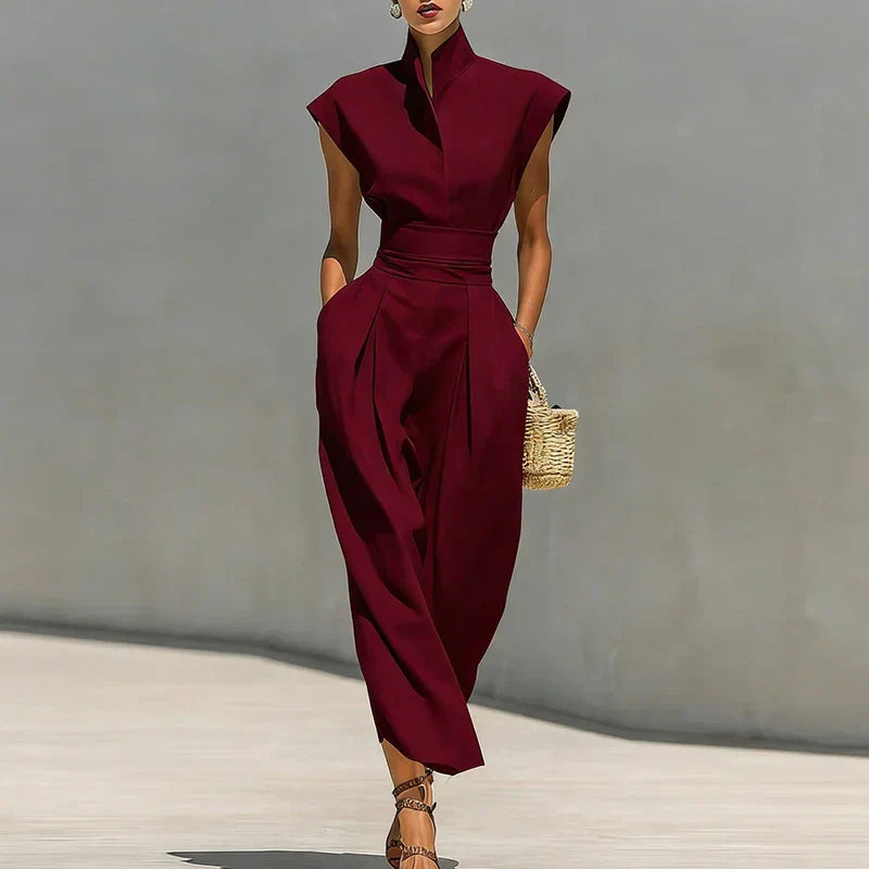 Women's structured midi dress with a flattering cinched waist, perfect for professional wear or elegant events.