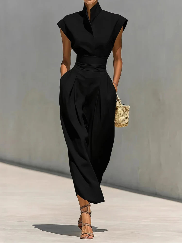 Sophisticated women's tailored midi dress, featuring a stand collar, cinched waist, and hidden pockets.