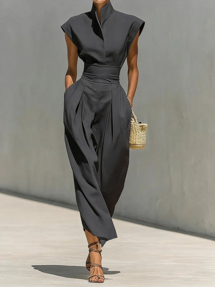 Elegant women's midi dress with a cinched waist creating a flattering silhouette for work, cocktail, or dinner.
