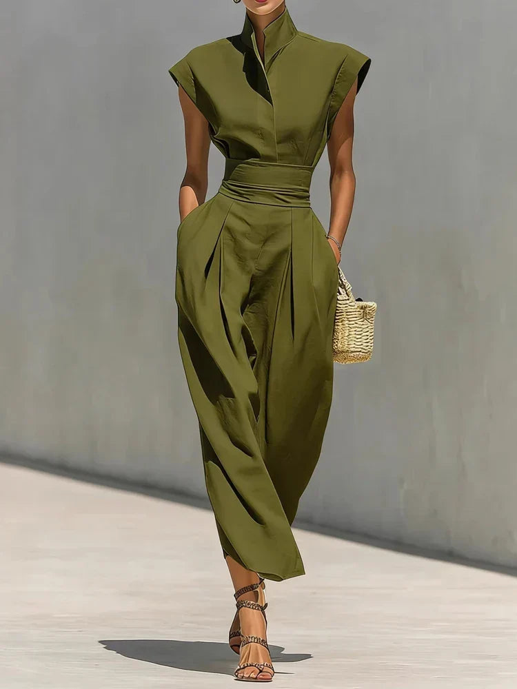 Professional women's structured midi dress with a cinched waist & stand collar. Ideal for workday or dinner.