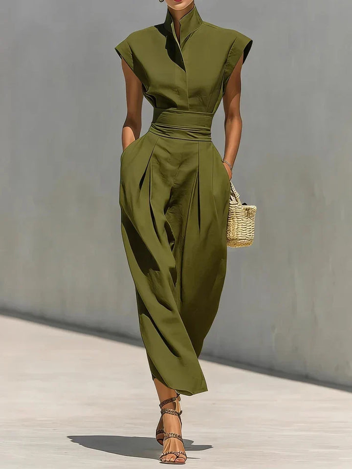 Professional women's structured midi dress with a cinched waist & stand collar. Ideal for workday or dinner.